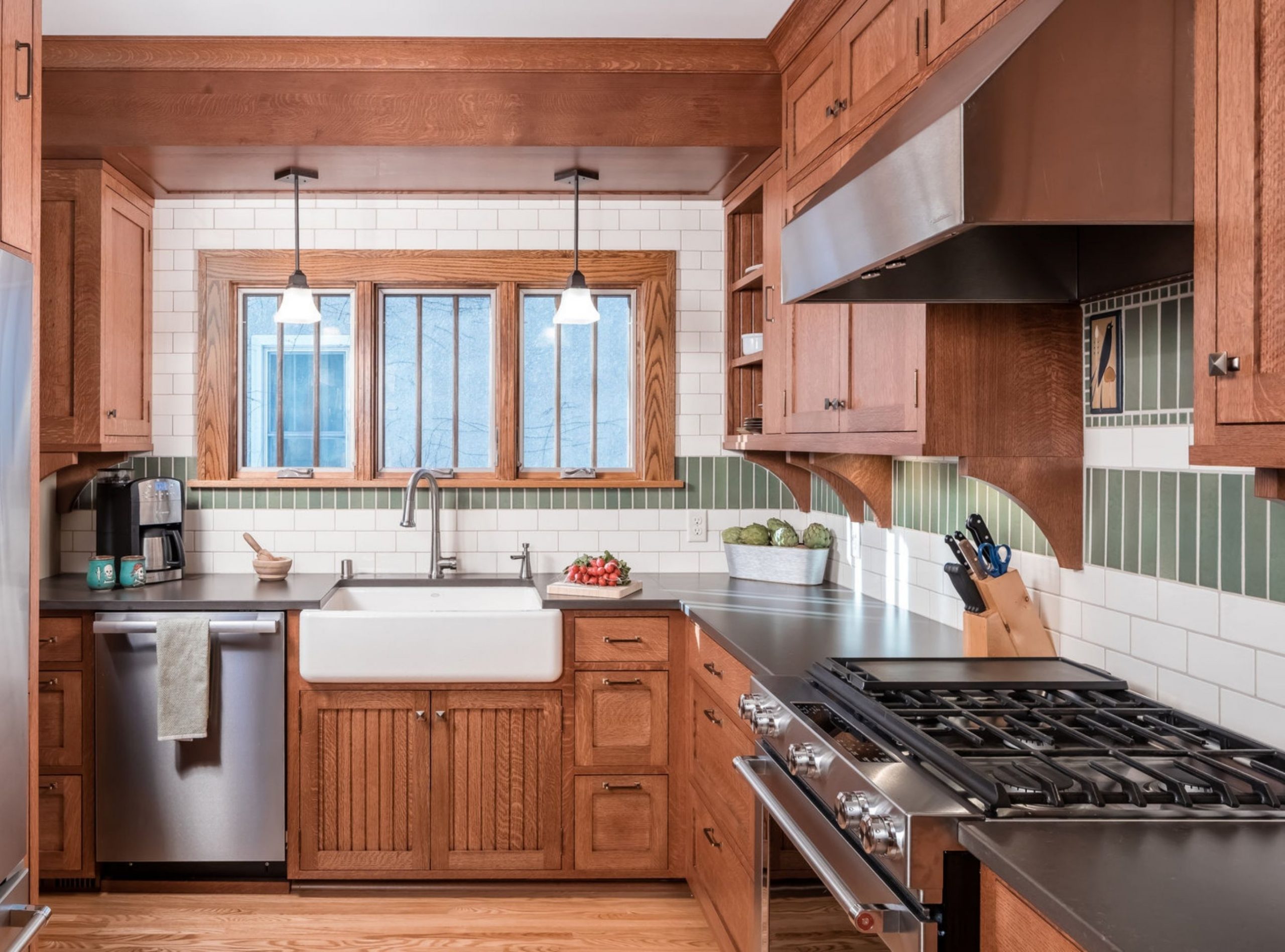 Timeless kitchen design with brown cabinets, stainless steel, and windows