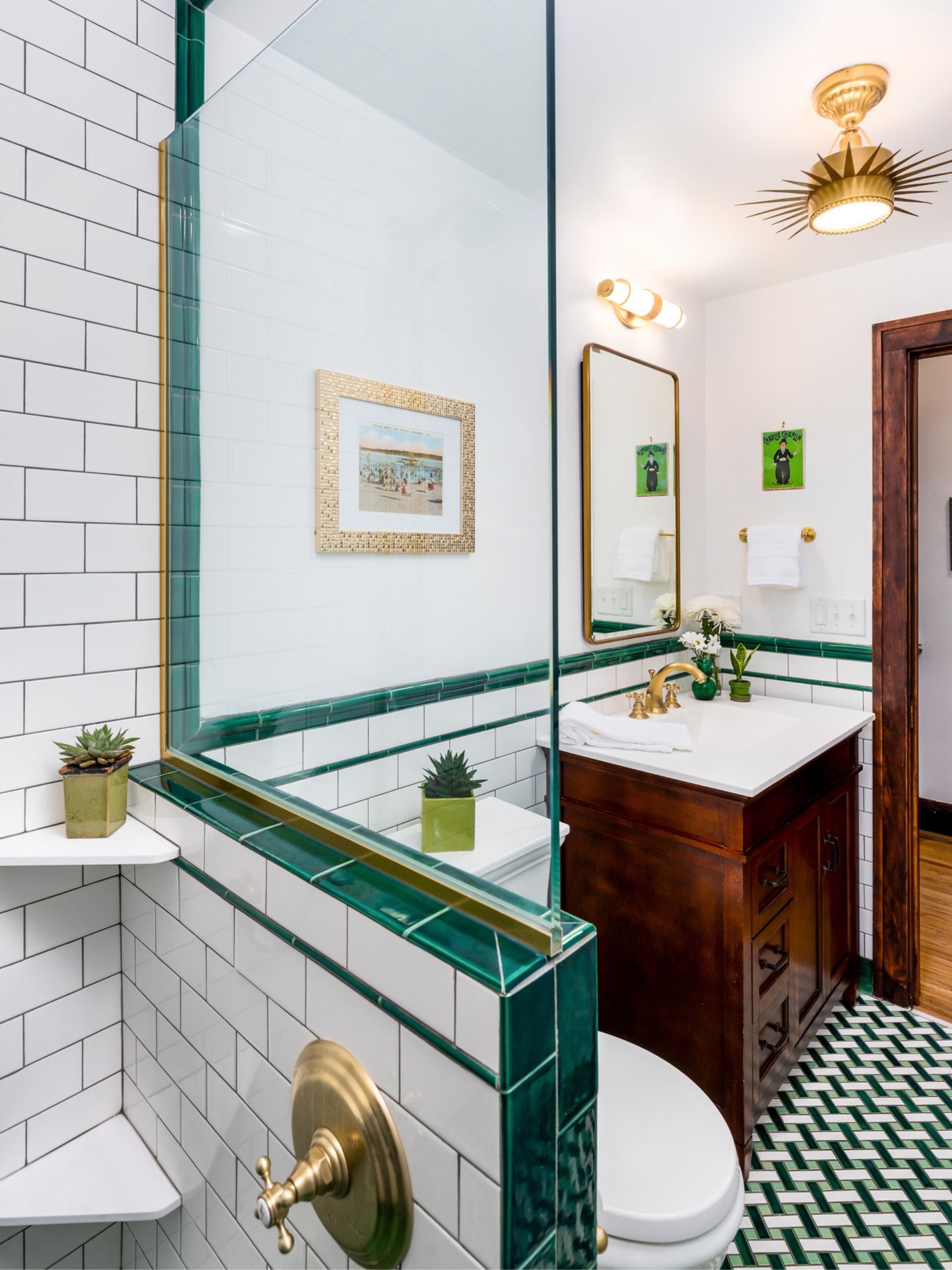 green bathroom design with dark vanity