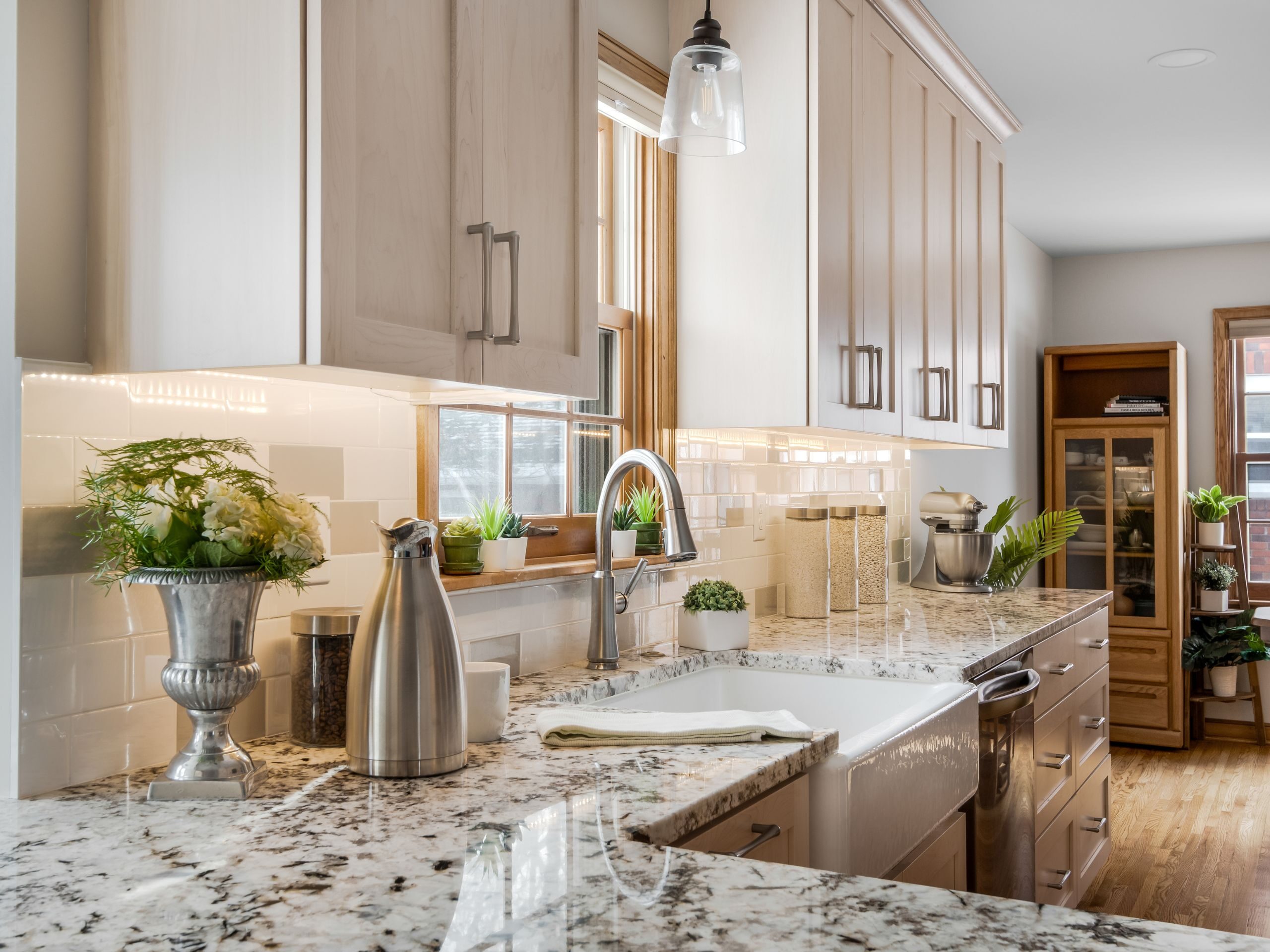 expanding kitchen into dining room for a kitchen sink, countertop and white subway backsplash